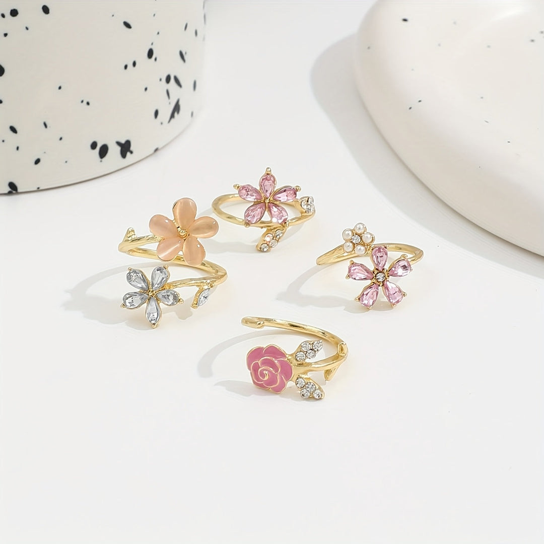 Ringkollektion i legering med strass och pärlor