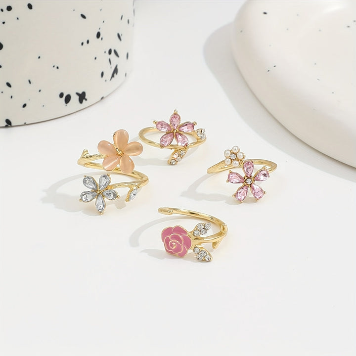 Ringkollektion i legering med strass och pärlor