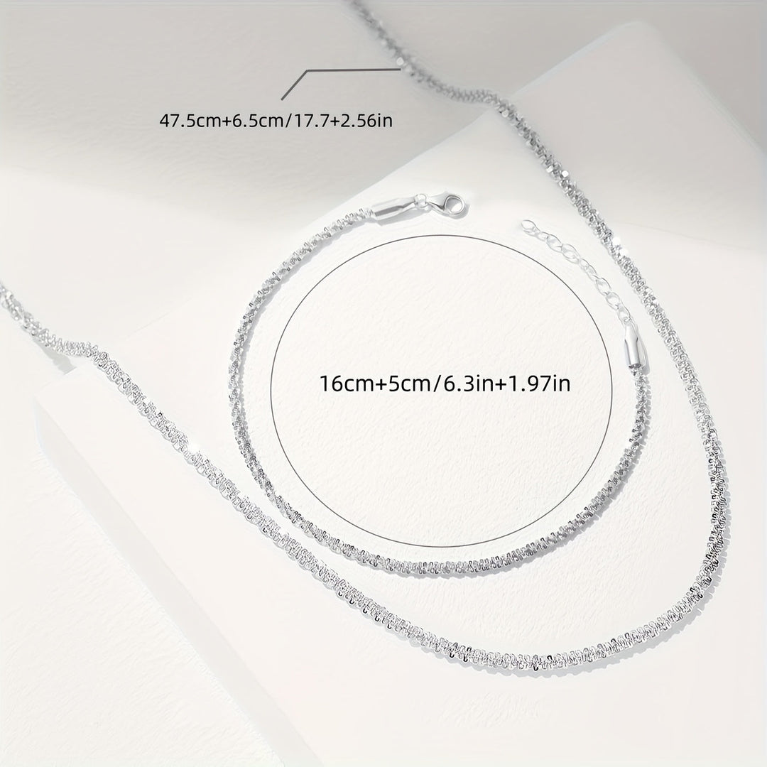 Chic gnistrande smyckesset med armband och halsband