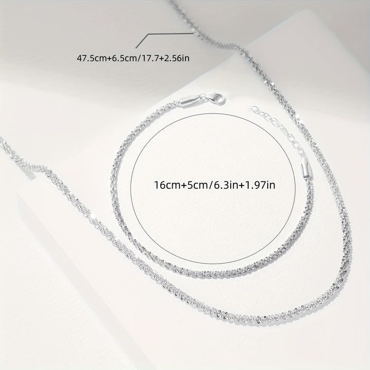 Chic gnistrande smyckesset med armband och halsband