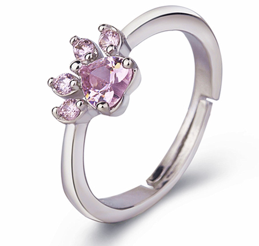 Roséguld Paws Smyckeset – 4 Delar med Zirkonia Hjärta" can be rewritten as:

"Roséguld Paws Smyckeset – 4 Delar med Zirkonia-Hjärta
