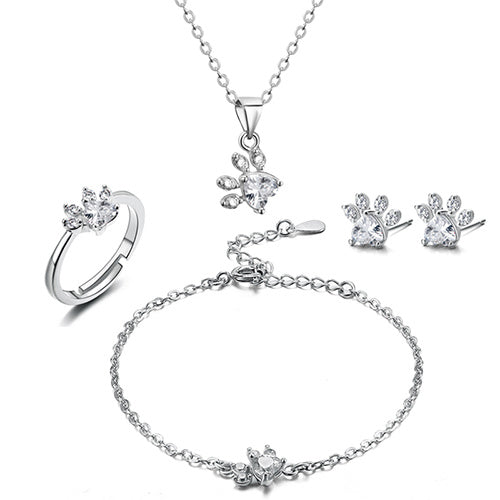 Roséguld Paws Smyckeset – 4 Delar med Zirkonia Hjärta" can be rewritten as:

"Roséguld Paws Smyckeset – 4 Delar med Zirkonia-Hjärta
