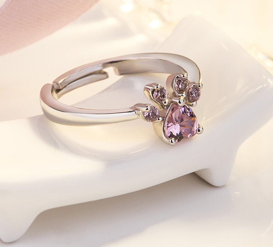 Roséguld Paws Smyckeset – 4 Delar med Zirkonia Hjärta" can be rewritten as:

"Roséguld Paws Smyckeset – 4 Delar med Zirkonia-Hjärta