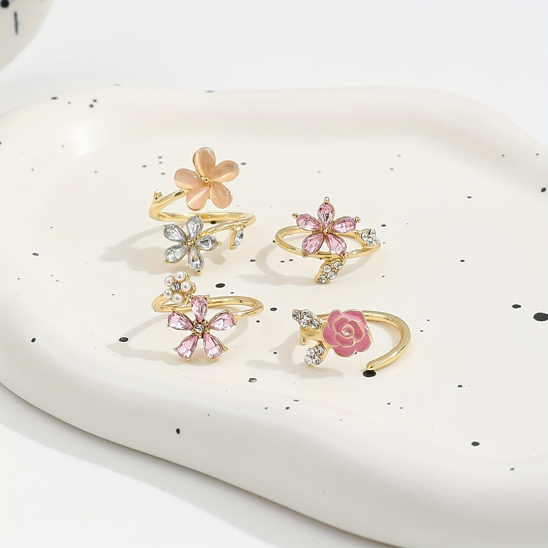 Ringkollektion i legering med strass och pärlor