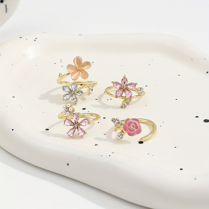 Ringkollektion i legering med strass och pärlor