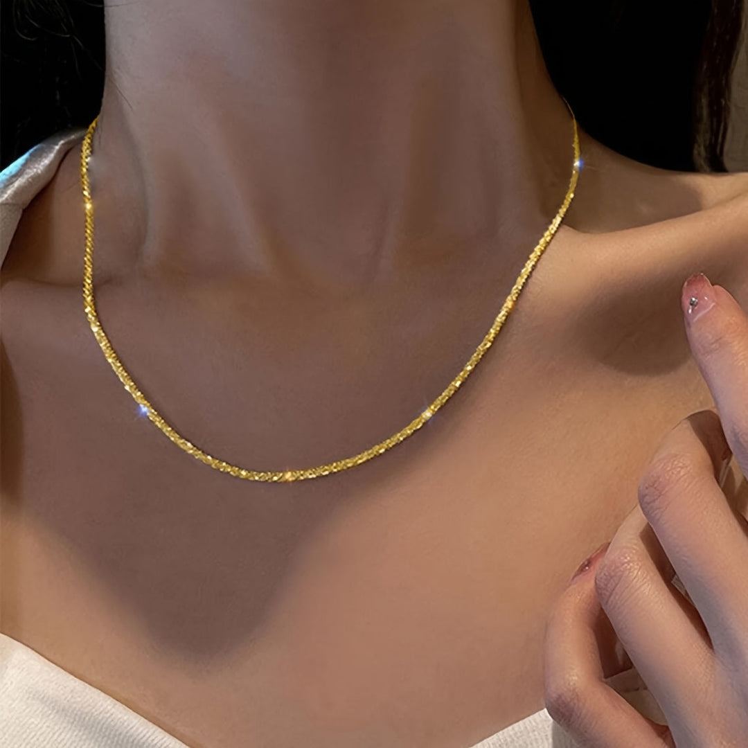 Chic gnistrande smyckesset med armband och halsband