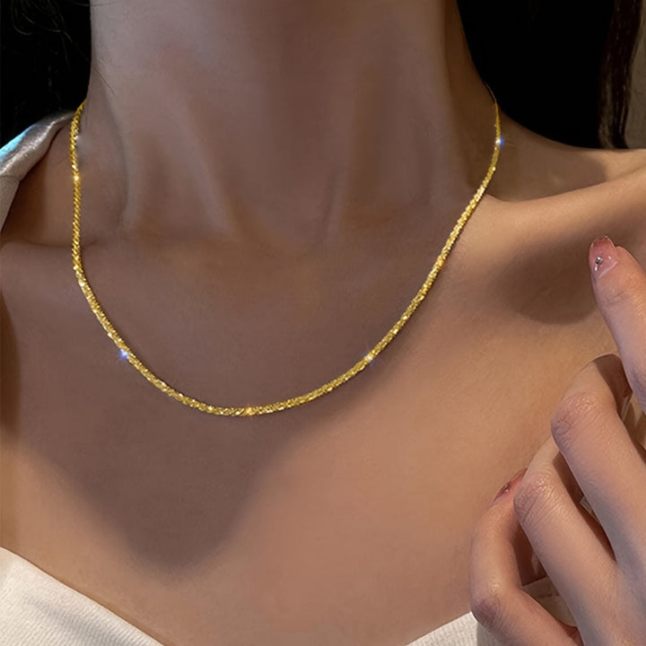 Chic gnistrande smyckesset med armband och halsband