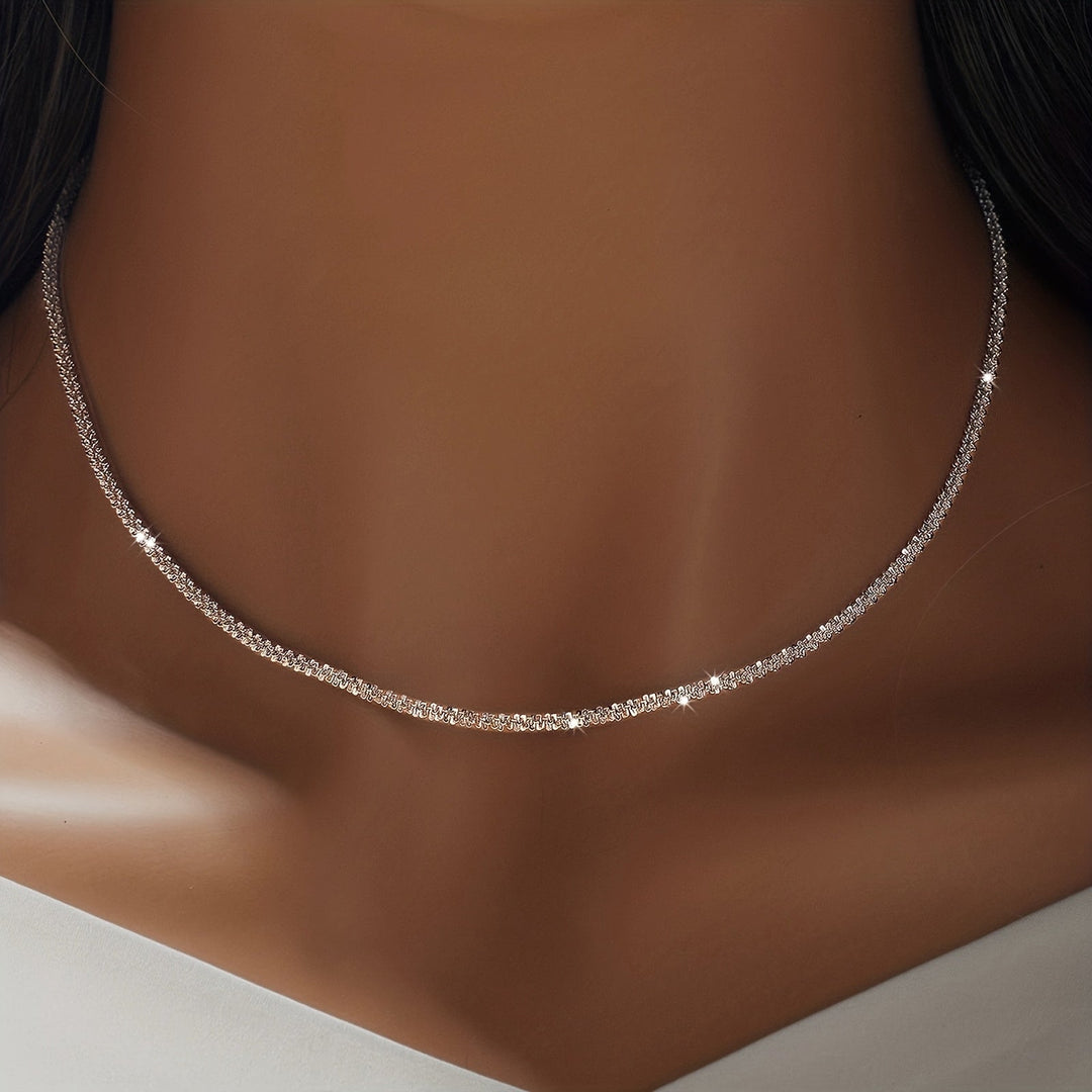 Chic gnistrande smyckesset med armband och halsband