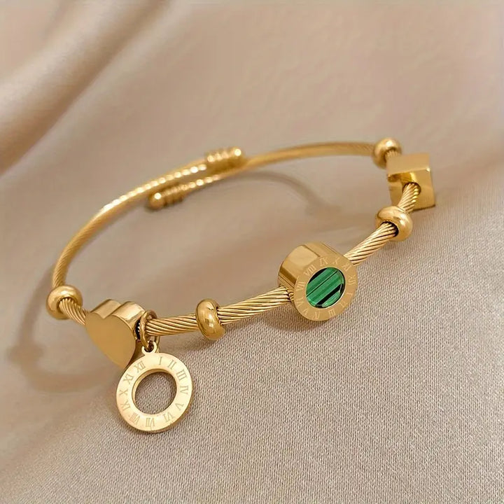 Ring i Guld med Grön Ädelsten