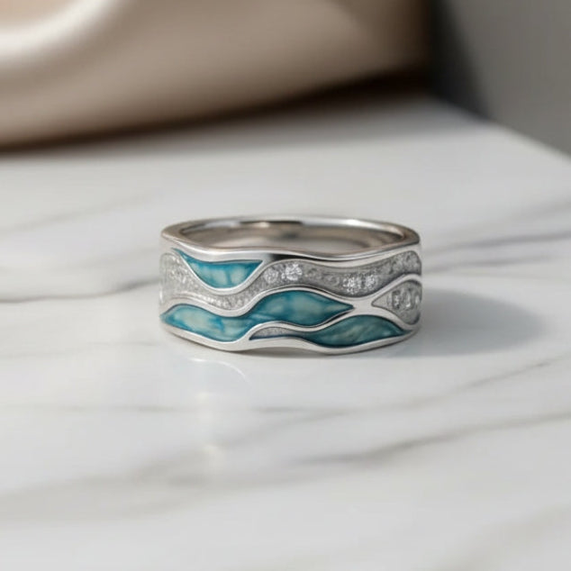 Elegant silverring med turkosa vågor