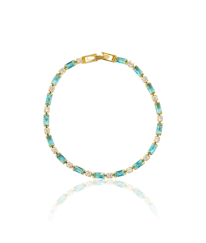 Elegant armband i naturlig turkos och guld