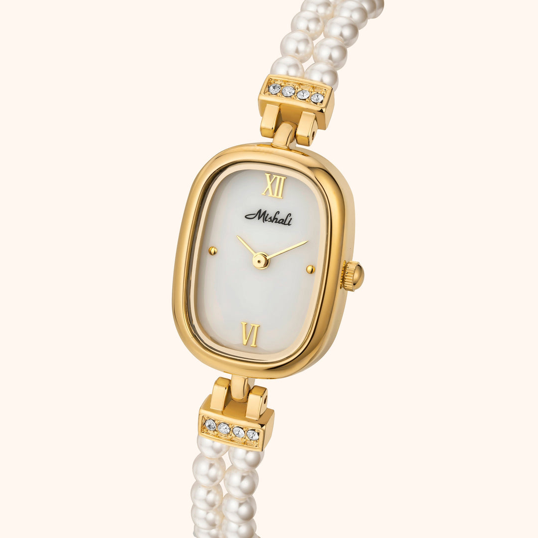 Armbandsur med pärlor och guld