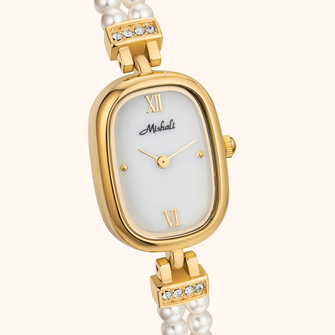Armbandsur med pärlor och guld