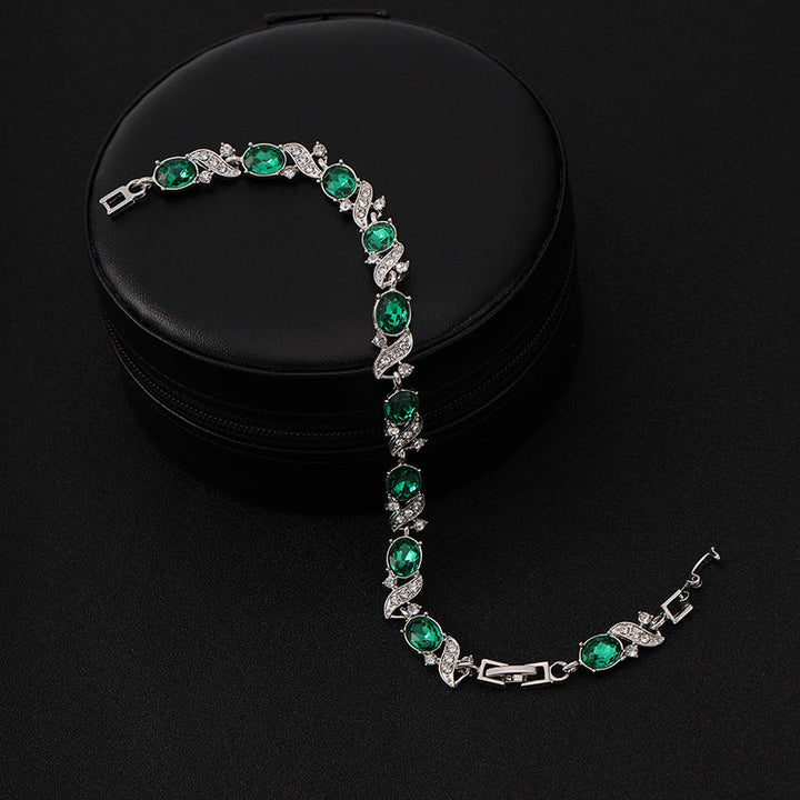 Silverarmband med smaragdgrön stenar