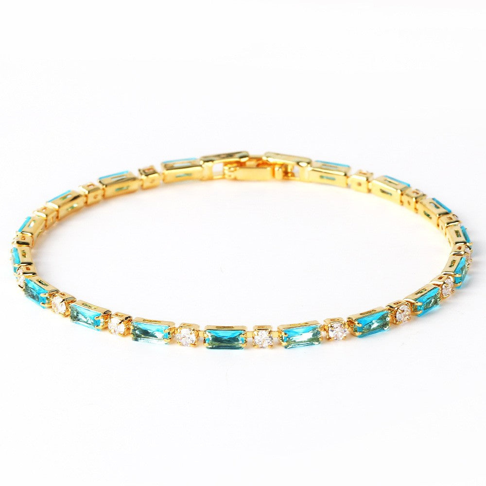 Elegant armband i naturlig turkos och guld