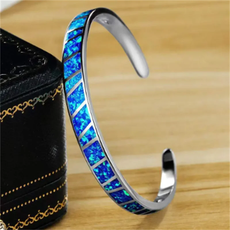 Stylish Adjustable Bangle with Elegant Silver and Blue Fire Opal