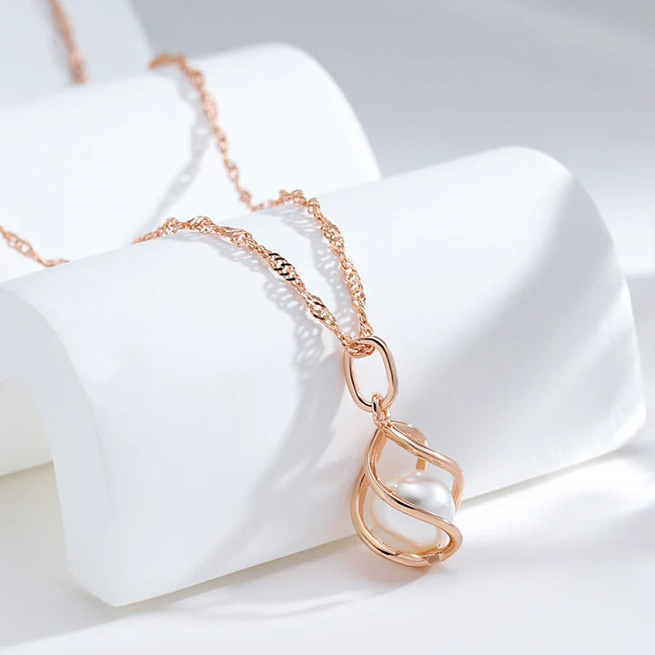 Exklusivt Geometriskt Halsband med Roséguld och Pärlor