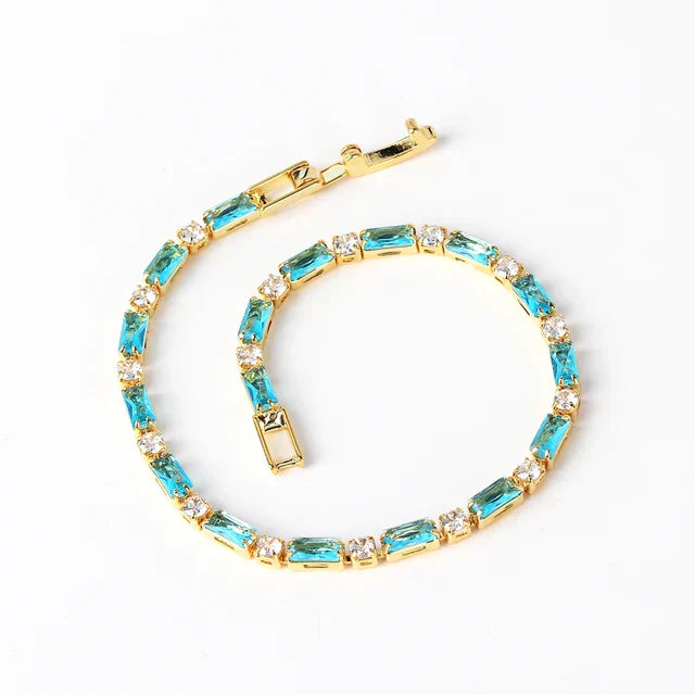 Elegant armband i naturlig turkos och guld