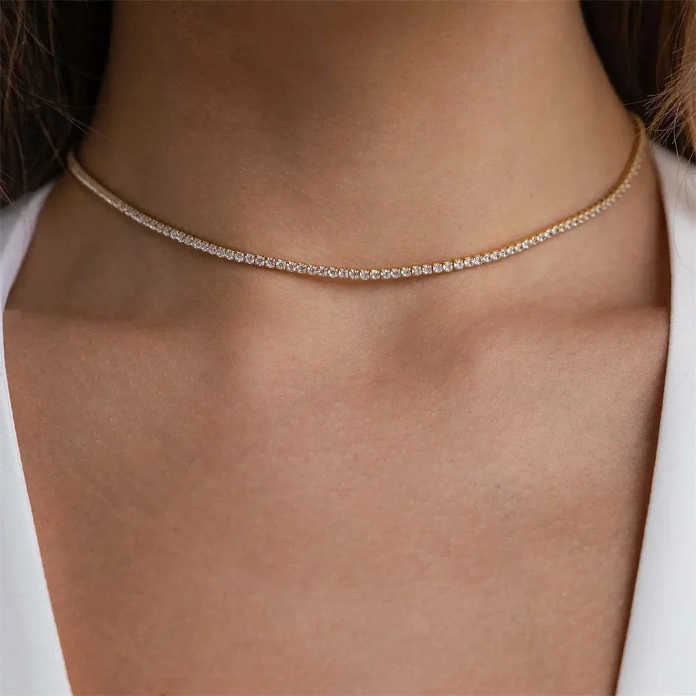 Elegant Guld Rostfritt Stål Tennis Halsband" can be rewritten as "Sleek Gold Stainless Steel Tennis Necklace.