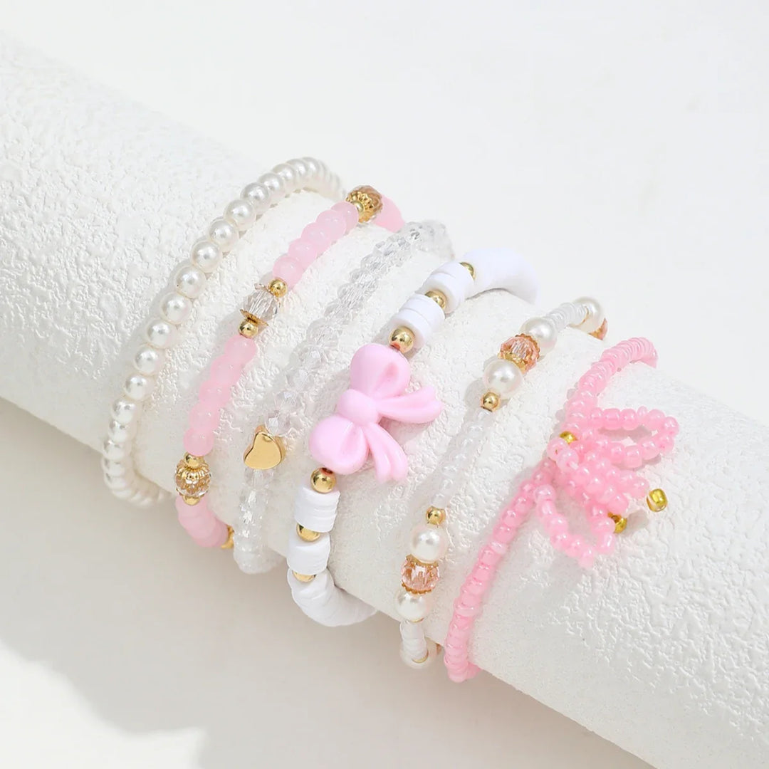Set med Armband i Pärlälskande Båge