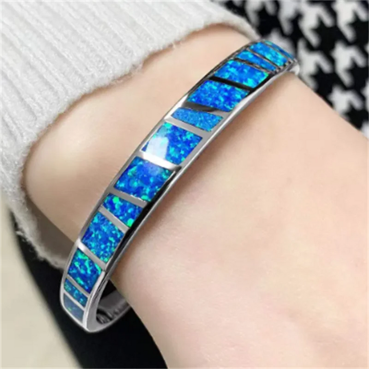 Stylish Adjustable Bangle with Elegant Silver and Blue Fire Opal