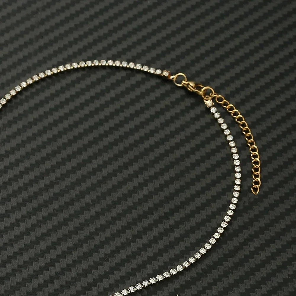 Elegant Guld Rostfritt Stål Tennis Halsband" can be rewritten as "Sleek Gold Stainless Steel Tennis Necklace.