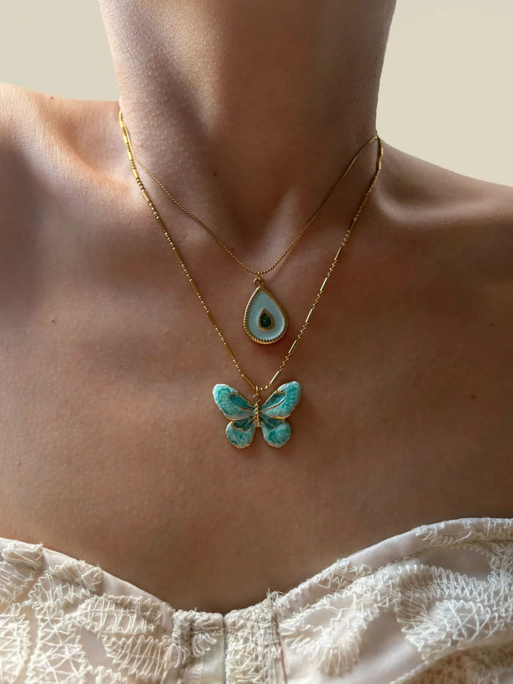 Charmigt Blått Fjäril och Vattendroppe Halsband Set
