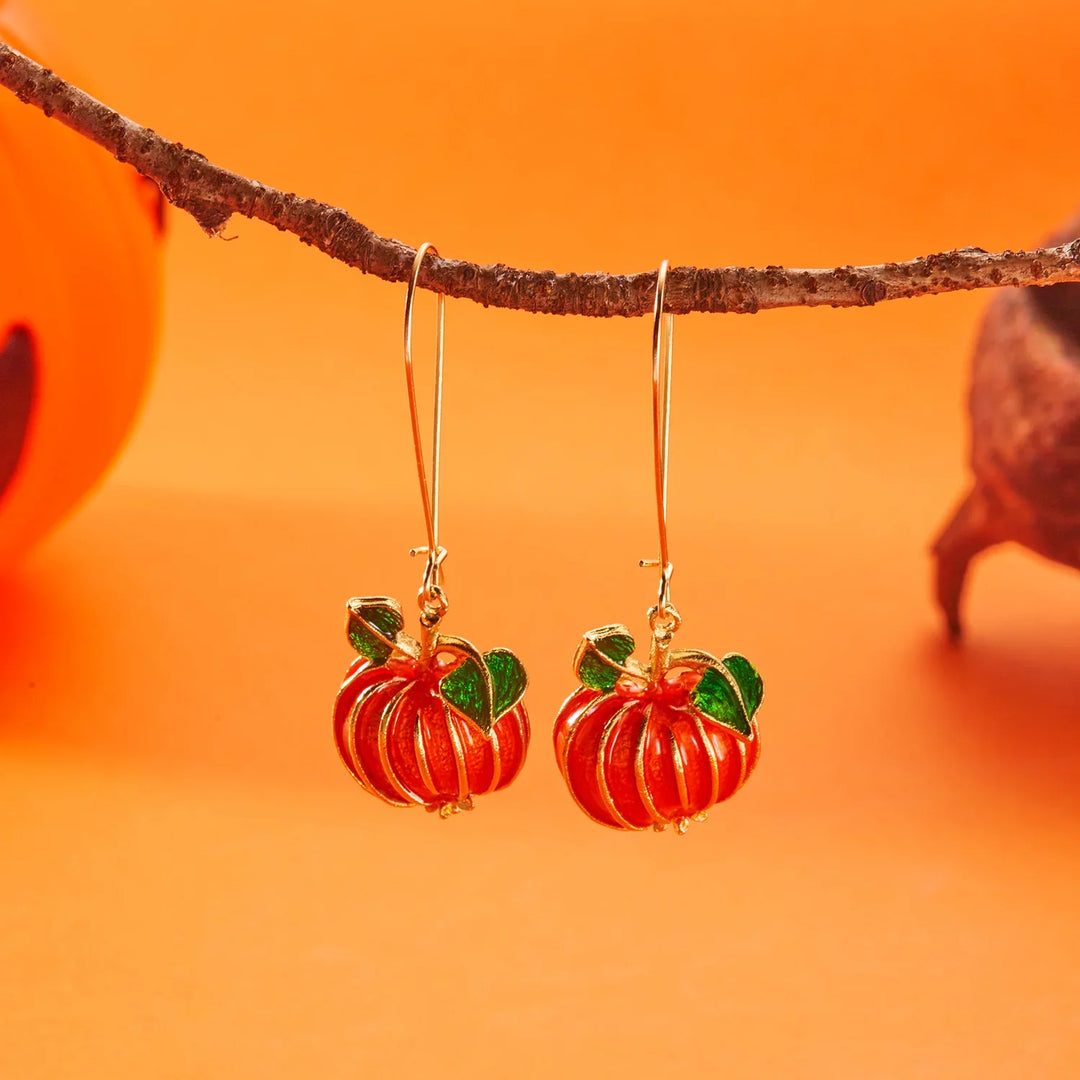 Halloween Pumpa Godis Örhängen" can be rewritten as "Pumpkin Candy Earrings for Halloween.