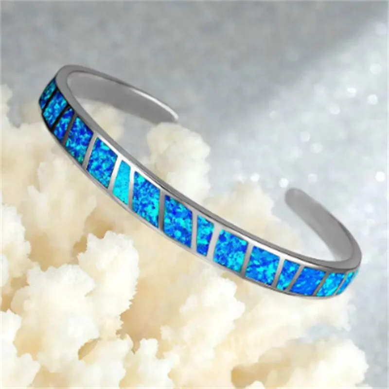 Stylish Adjustable Bangle with Elegant Silver and Blue Fire Opal