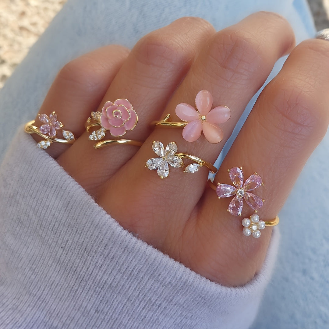 Ringkollektion i legering med strass och pärlor