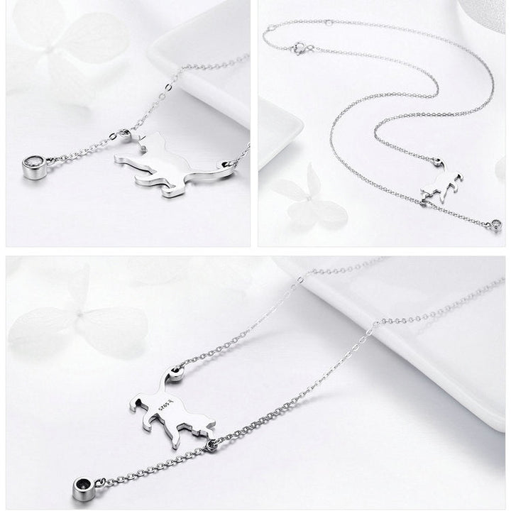 "Söt kattkedja hängande halsband" can be rewritten as "Charmigt hängande halsband med kattmotiv".