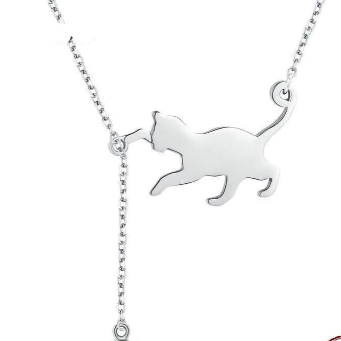 "Söt kattkedja hängande halsband" can be rewritten as "Charmigt hängande halsband med kattmotiv".