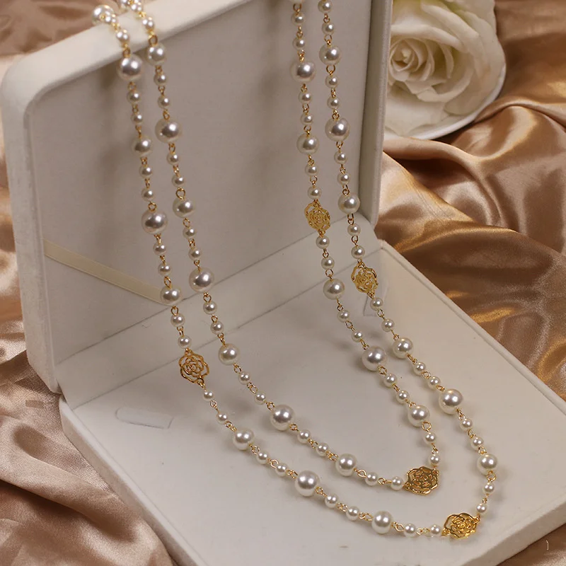 Elegant guldhalsband med pärla