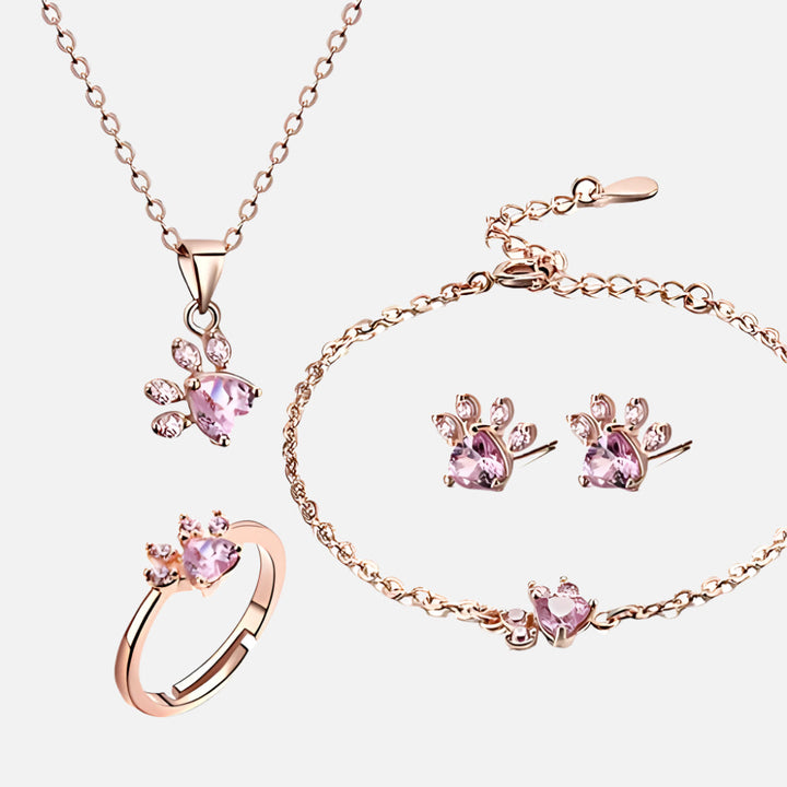 Roséguld Paws Smyckeset – 4 Delar med Zirkonia Hjärta" can be rewritten as:

"Roséguld Paws Smyckeset – 4 Delar med Zirkonia-Hjärta
